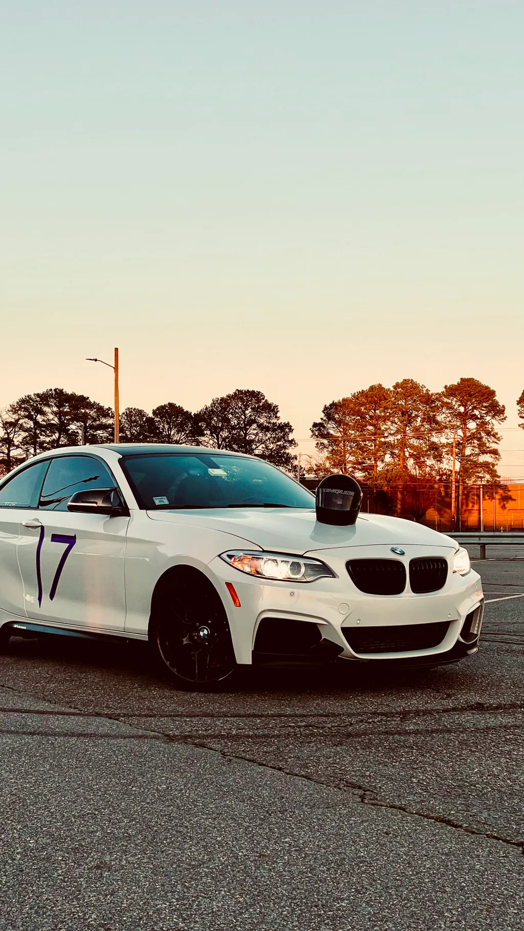 BMW cars gathered in a parking lot