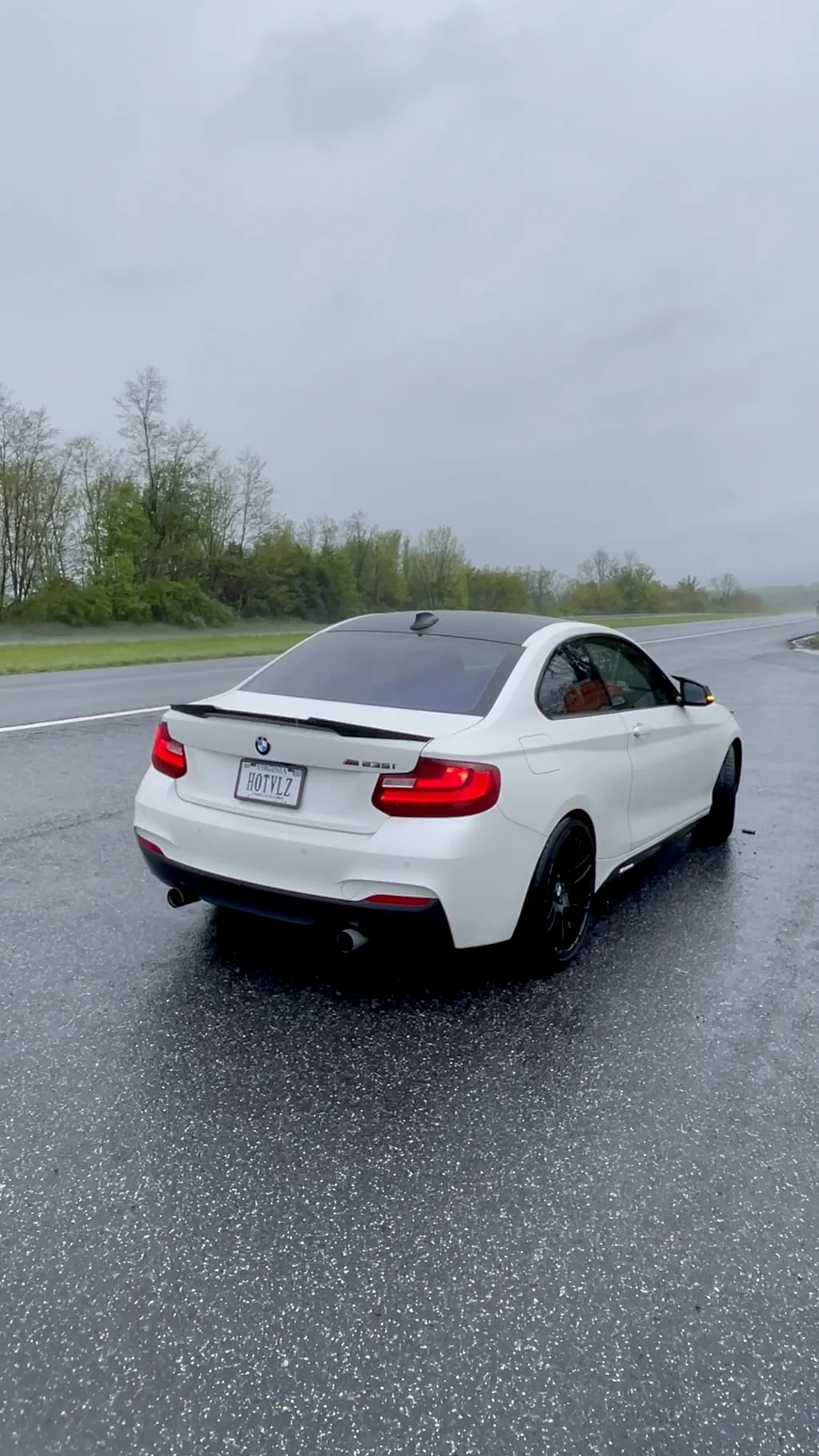 Rear view of white BMW M235i